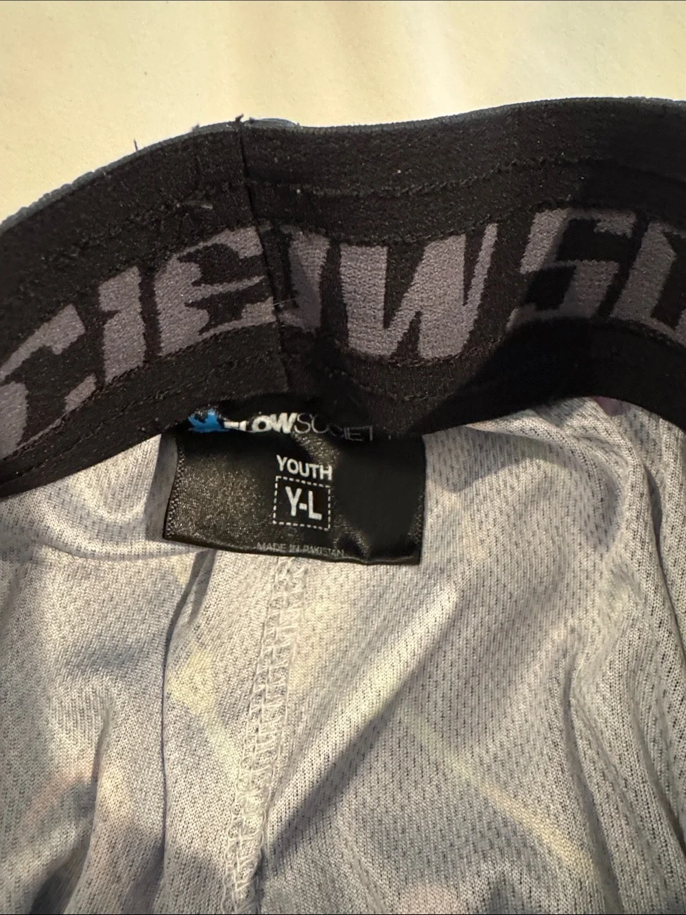 Flow Society Black Lacrosse Print Athletic Shorts with orange trim - Picture 3 of 3